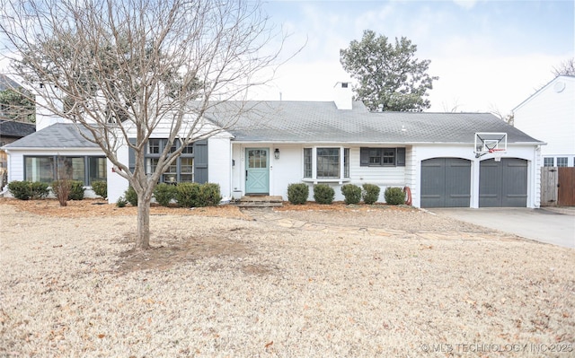 ranch-style house featuring a garage