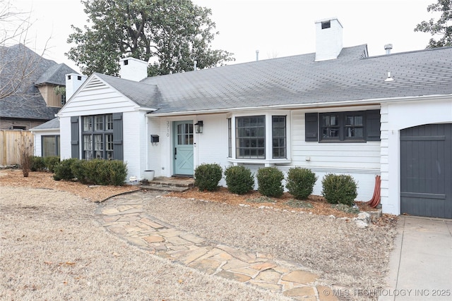 single story home with a garage