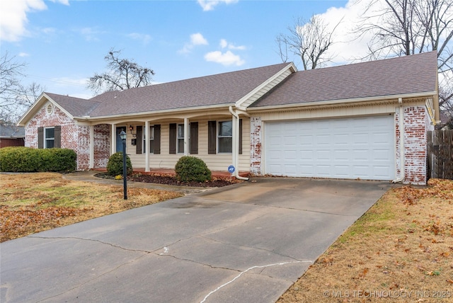 ranch-style home featuring a garage and a front yard