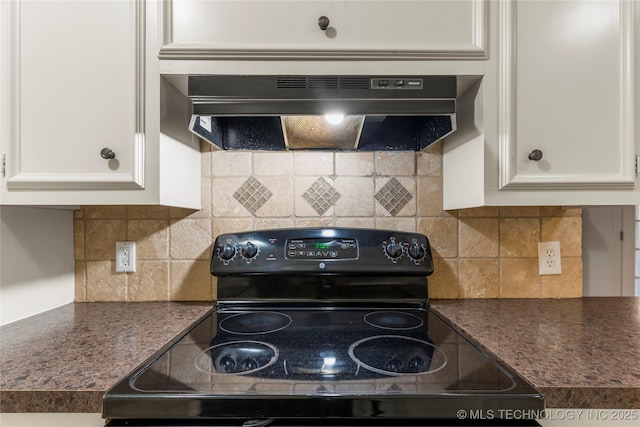 kitchen featuring backsplash, ventilation hood, black electric range oven, and white cabinets