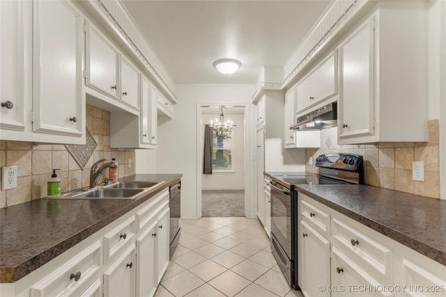 kitchen with sink, an inviting chandelier, black appliances, white cabinets, and light tile patterned flooring