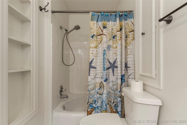 bathroom featuring shower / tub combo with curtain and toilet