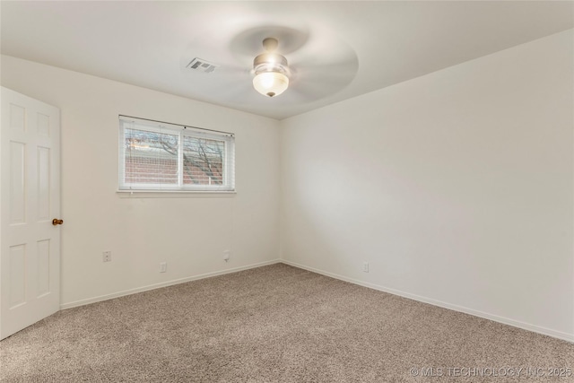 empty room with carpet floors and ceiling fan