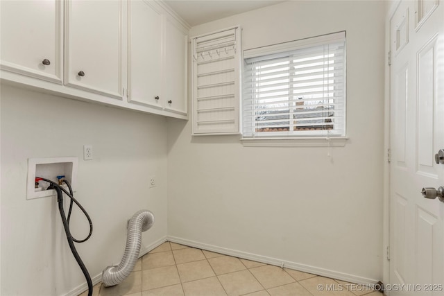 laundry room featuring washer hookup, cabinets, and light tile patterned flooring