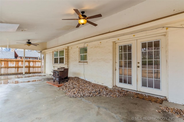 view of patio / terrace with french doors and ceiling fan