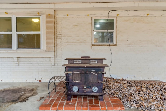 exterior details featuring a wood stove