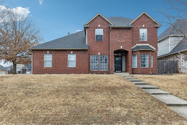 view of property featuring a front yard