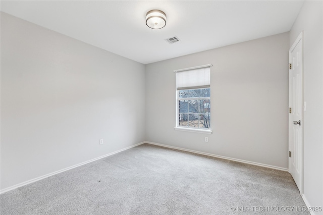 view of carpeted spare room