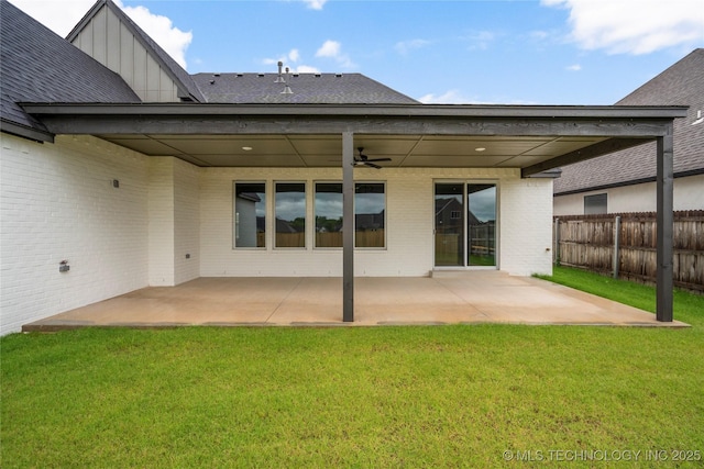 2078 E 136th Pl S, Bixby, OK 74008 - rear view of property with a patio, board and batten siding, a ceiling fan, and brick siding