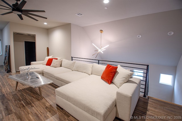 living room featuring hardwood / wood-style flooring and ceiling fan