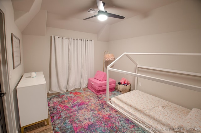 bedroom featuring hardwood / wood-style flooring and ceiling fan