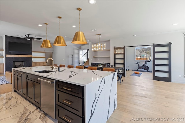 3748 E 116th St S, Tulsa, OK 74137 - kitchen featuring a sink, open floor plan, a brick fireplace, dishwasher, and ceiling fan