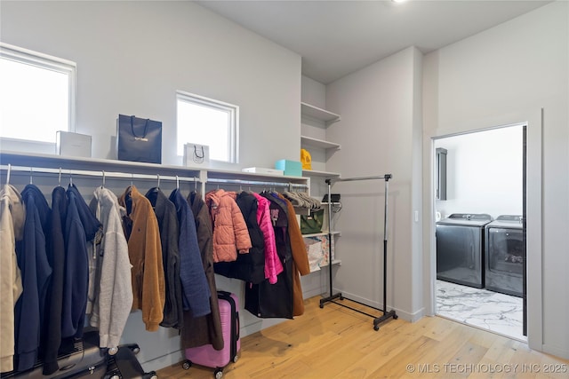 3748 E 116th St S, Tulsa, OK 74137 - walk in closet featuring washer and clothes dryer and wood finished floors