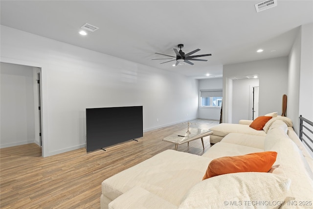 3748 E 116th St S, Tulsa, OK 74137 - living area featuring light wood-style floors, a ceiling fan, recessed lighting, and baseboards
