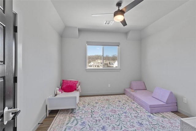 3748 E 116th St S, Tulsa, OK 74137 - sitting room with ceiling fan, wood finished floors, and baseboards