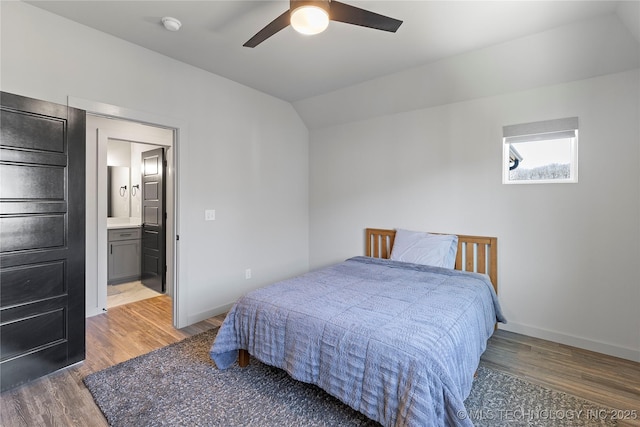 3748 E 116th St S, Tulsa, OK 74137 - bedroom featuring wood finished floors, vaulted ceiling, baseboards, a ceiling fan, and ensuite bathroom