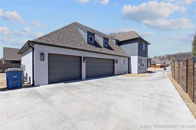3748 E 116th St S, Tulsa, OK 74137 - view of side of home with brick siding, fence, and driveway