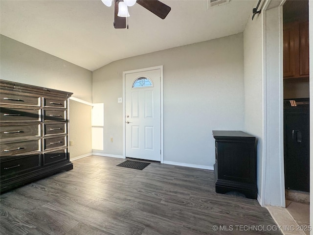 entrance foyer with lofted ceiling, dark hardwood / wood-style floors, and ceiling fan