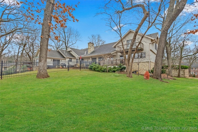 view of yard featuring a balcony