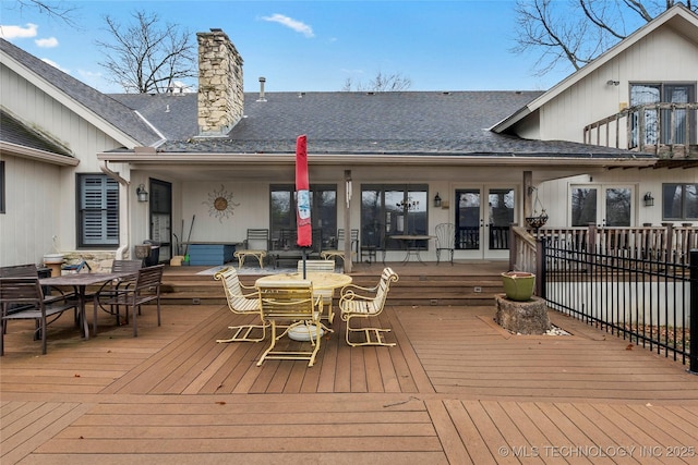 wooden terrace featuring french doors