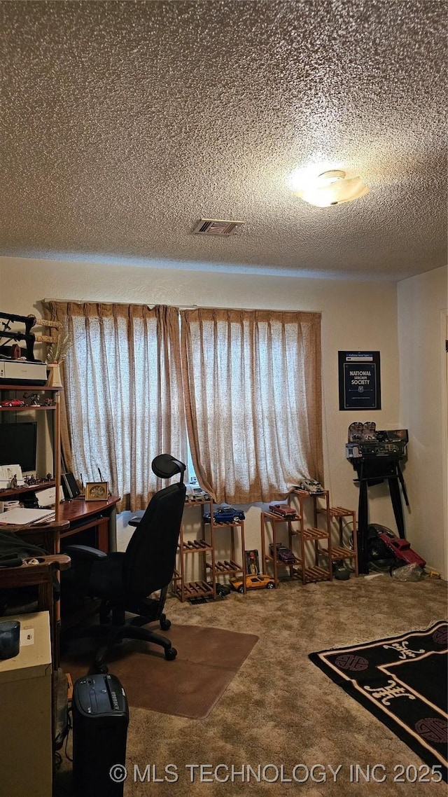 office space featuring a textured ceiling