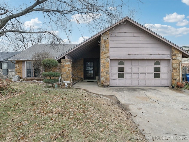 ranch-style home featuring a garage