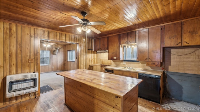 kitchen featuring heating unit, wooden walls, black dishwasher, ceiling fan, and wood ceiling