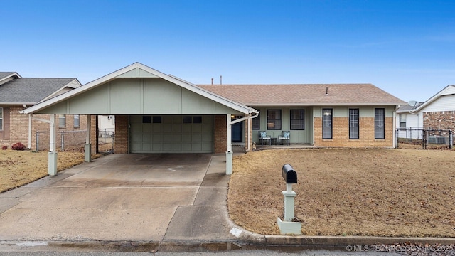 single story home featuring a porch and a garage