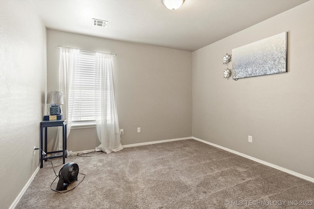 view of carpeted spare room