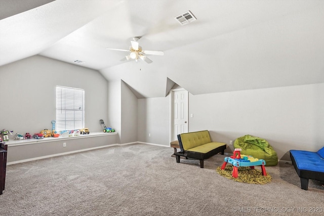 rec room featuring lofted ceiling, carpet floors, and ceiling fan