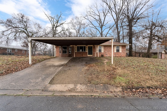 single story home featuring a carport