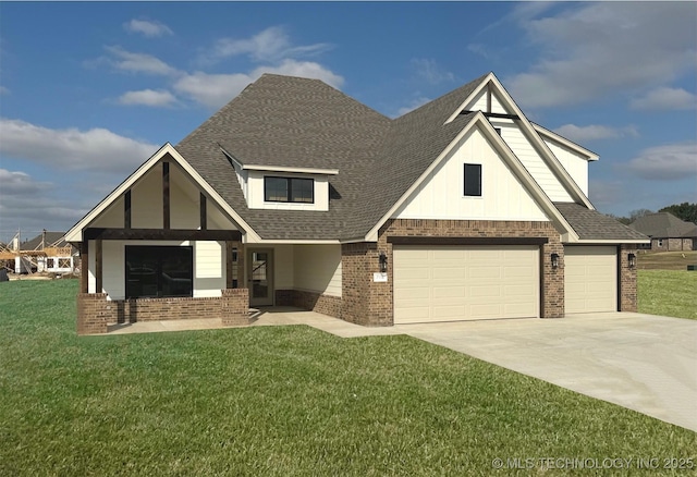 view of front of home featuring a garage and a front yard