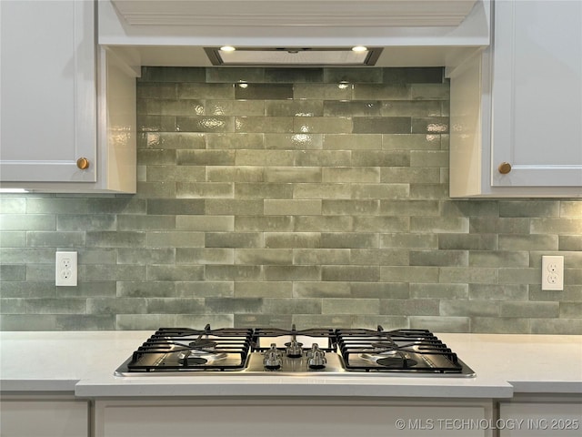 kitchen featuring white cabinetry, tasteful backsplash, and stainless steel gas stovetop