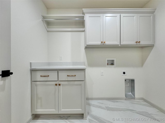 laundry room with cabinets, hookup for a washing machine, and electric dryer hookup