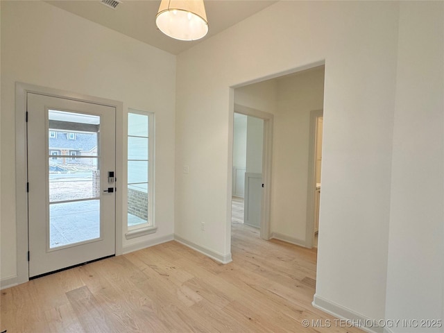 entryway with light wood-type flooring