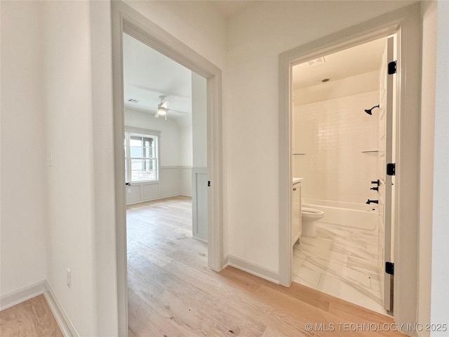 hall featuring light hardwood / wood-style flooring