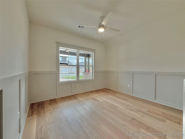 unfurnished room with light hardwood / wood-style floors and ceiling fan