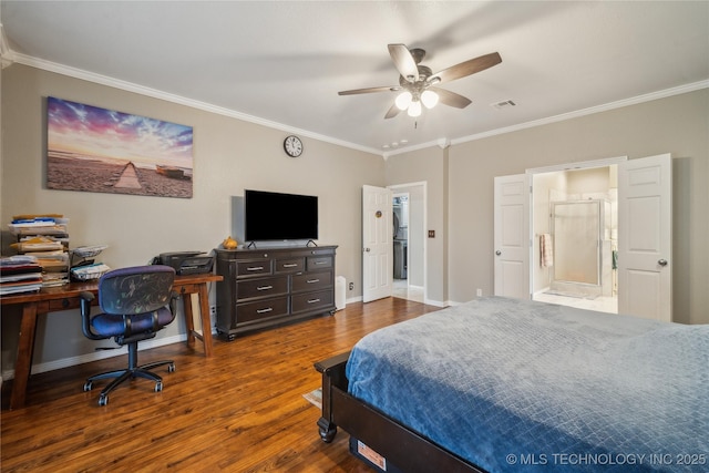 bedroom with ornamental molding, dark hardwood / wood-style floors, and ensuite bathroom