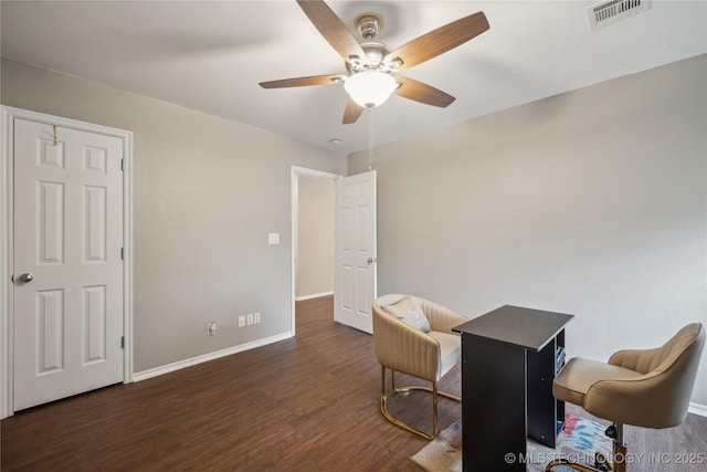 office space with dark hardwood / wood-style flooring and ceiling fan