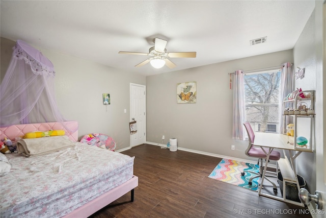 bedroom with ceiling fan and dark hardwood / wood-style flooring