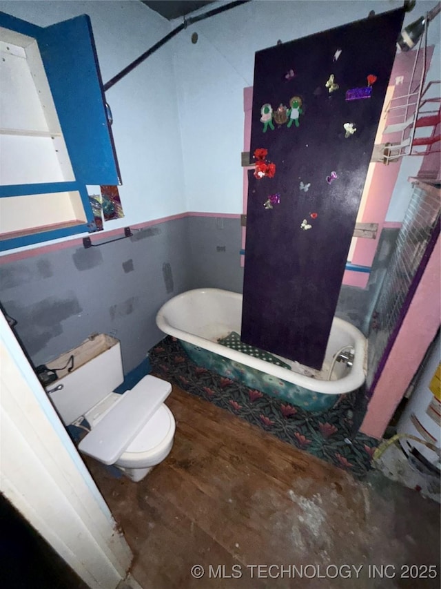 bathroom featuring toilet and hardwood / wood-style floors