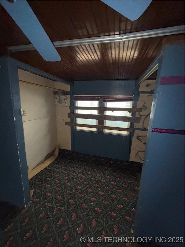 hallway featuring wood ceiling