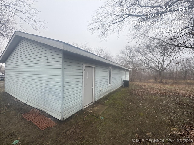 view of property exterior featuring central AC