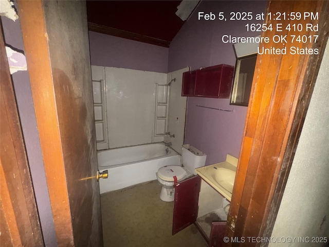 bathroom with shower / bathtub combination and toilet