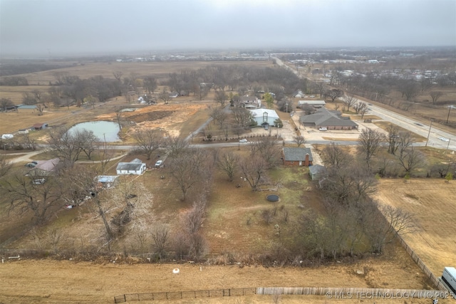 drone / aerial view with a water view and a rural view