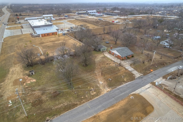 birds eye view of property featuring a rural view