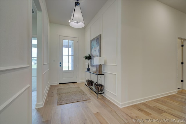 foyer entrance featuring light hardwood / wood-style floors