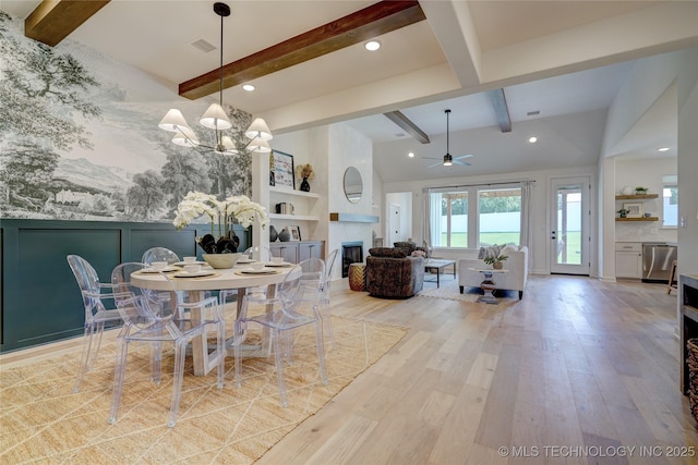 dining area with beam ceiling, light hardwood / wood-style flooring, and ceiling fan with notable chandelier