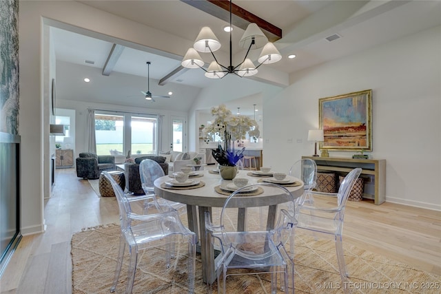 dining room with beam ceiling, ceiling fan with notable chandelier, and light hardwood / wood-style floors