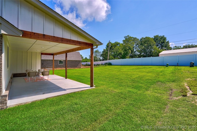 view of yard with a patio area